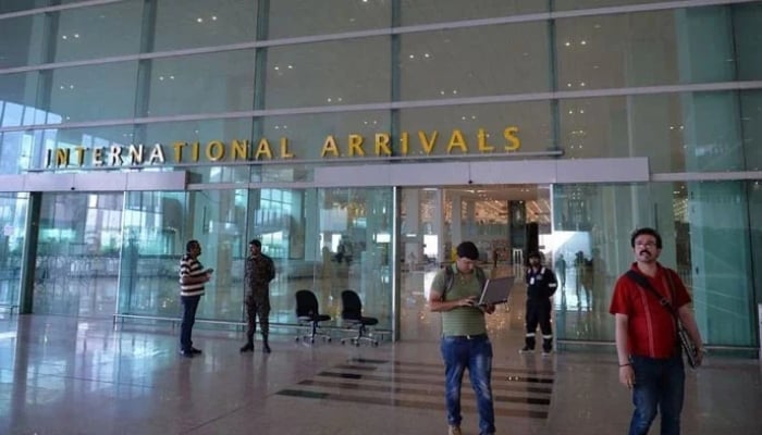 A photograph of the Islamabad airport shows travellers at the international arrival gate. — AFP/File