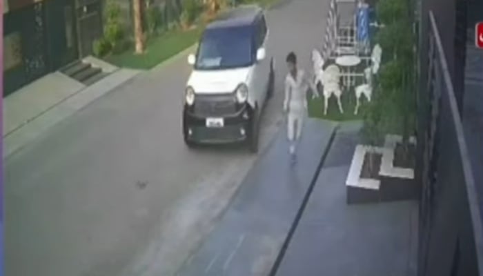 The boy is seen running before the car strikes him down. — Screengrab via Geo News