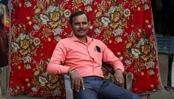 Kamal Lal, 38, a teacher and voter who says his name was removed from the voter list and is placed in the Permanently Shifted category in the Special Intensive Revision (SIR) list, poses for a photograph during Reuters interview in New Delhi, India, October 16, 2026. — Reuters