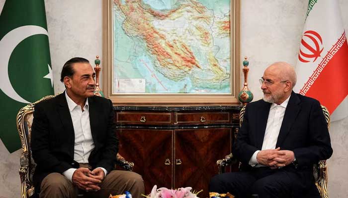 Iranian Parliament Speaker Mohammad Bagher Ghalibaf meets Chief of Defence Forces and Chief of Army Staff Field Marshal Asim Munir in Tehran, Iran, August 24, 2026. — Reuters
