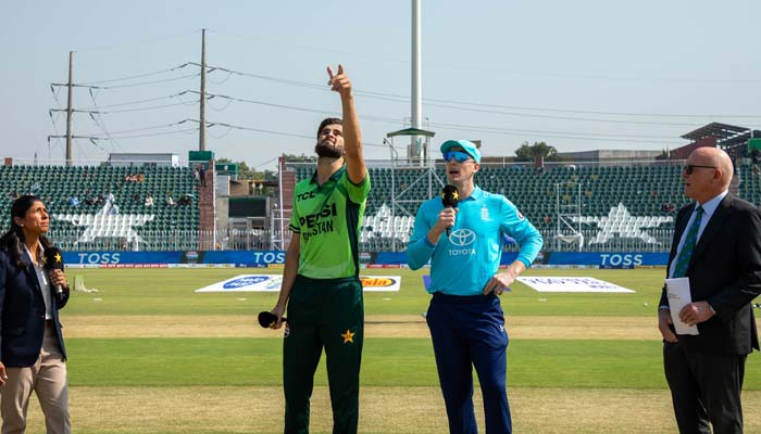 Pakistan captain Shaheen Afridi (left) flips the coin as England captain Harry Brook (centre) calls during the toss ahead of the second match of the ODI tri-nation series at the Rawalpindi Cricket Stadium in Rawalpindi on October 20, 2026. — PCB