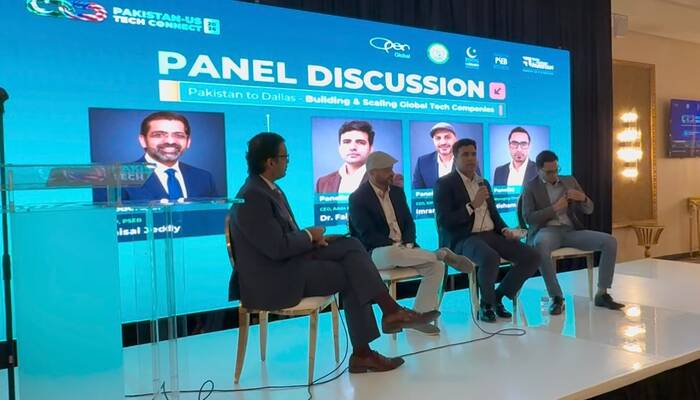 The panel discussion is underway. — Reporter