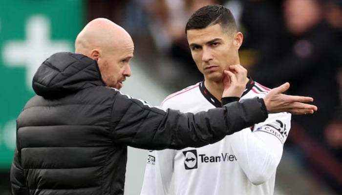 Manchester United former manager Erik ten Hag speaks with Cristiano Ronaldo before the start of the second half during their Premier League match against Aston Villa at Villa Park, Birmingham, Britain, on November 6, 2022. — Reuters