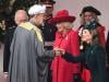 Princess Kate's graceful curtsy brings colour to rainy royal welcome