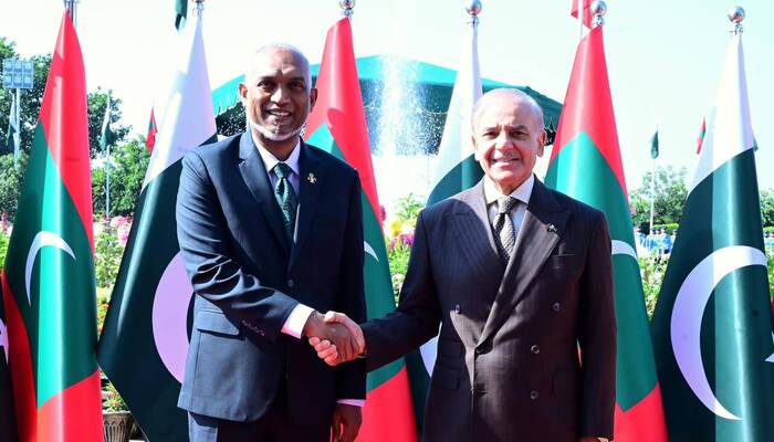 Maldives President Dr Mohamed Muizzu and PM Shehbaz Sharif shake hands after guard of honour ceremony at PM House in Islamabad on October 21, 2026. — X@GovtofPakistan
