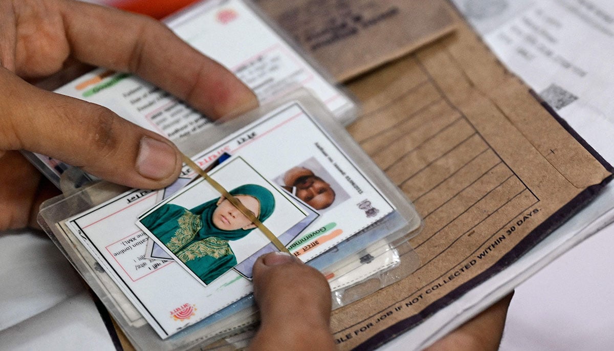 Indians struggle to prove voting eligibility amid voter roll revision 23 A man waits with documents to register for the Draft Electoral Roll 2026 as part of the Election Commission of Indias Special Intensive Revision (SIR), at a voter verification camp in New Delhi on October 18, 2026. — AFP