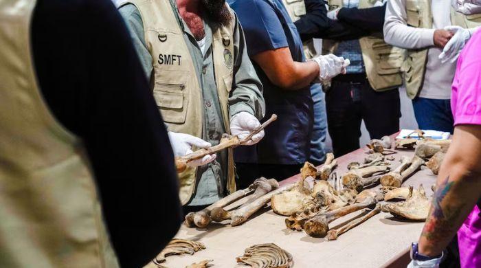 Syria identifies missing war victims through DNA for first time as 300,000 families await answers