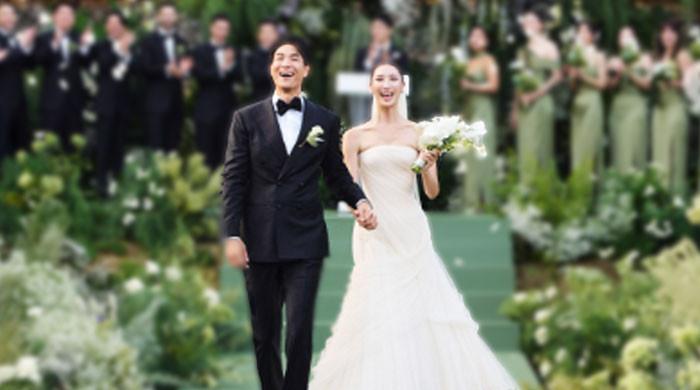 'Golden' hitmaker EJAE reveals all bridal looks in official wedding photos