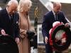 King Charles and William share warm smiles before laying wreaths at Aberfan