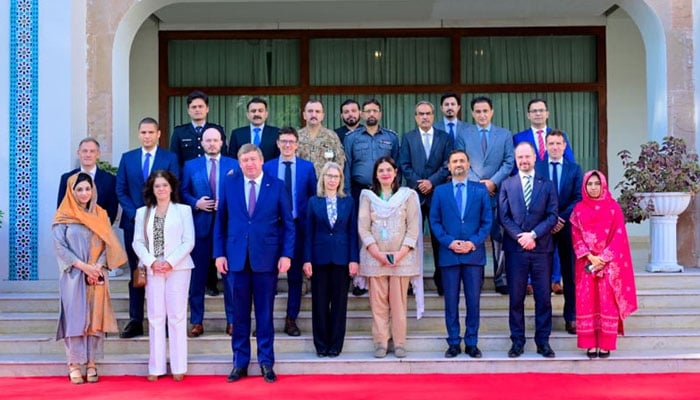 Dr Fareha Bugti (centre-right) and Anna Strzaska pose with members of the Pakistani and EU delegations during counterterrorism talks in Islamabad on October 22, 2026. — Radio Pakistan