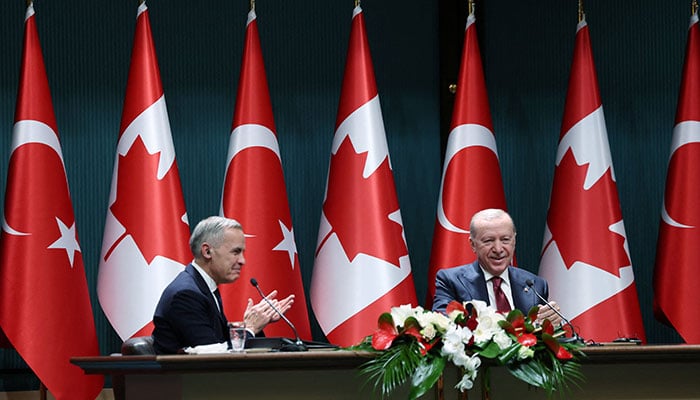 Turkish President Tayyip Erdogan and Canadian Prime Minister Mark Carney attend a press conference at the presidential palace in Ankara, Turkiye, October 22, 2026. — Reuters