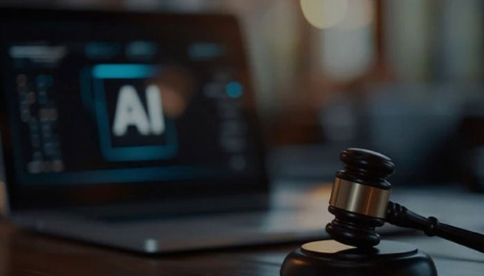 The illustrative picture shows an AI logo on a laptop screen in front of a judge’s gavel. — Reuters