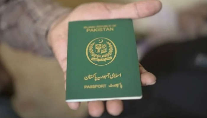 A person holding a Pakistani passport. — AFP.