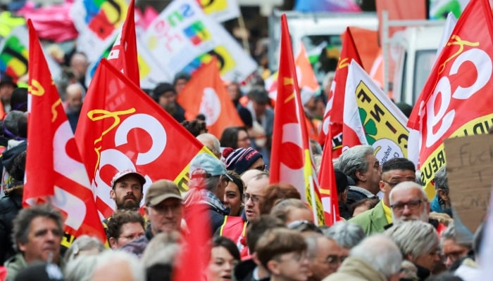 People attend a demonstration against racism, fascism, and imperialism as the French far-right Rassemblement National (National Rally, RN) party holds its congress in Orleans, France, October 24, 2026. — Reuters