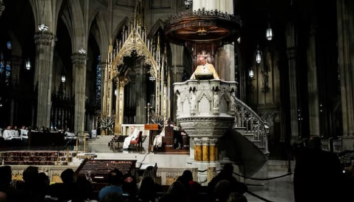 New York Archbishop Timothy Dolan attends the mass before blessing food donations prepared by Catholic Charities for families in need ahead of Thanksgiving week, outside St. Patrick’s Cathedral in New York City, US, November 23, 2025.— Reuters