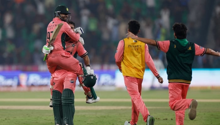 Pakistani players celebrate after winning the fourth match of the ODI tri-series against England at Gaddafi Stadium in Lahore on October 25, 2026. — Reuters