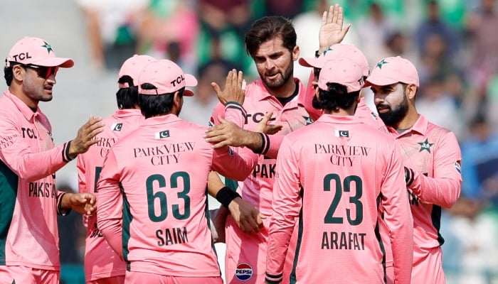 Pakistan captain Shaheen Afridi (centre) after taking the wicket of Englands Joe Root during the fourth match of the ODI tri-series at Gaddafi Stadium in Lahore on October 25, 2026. — Reuters