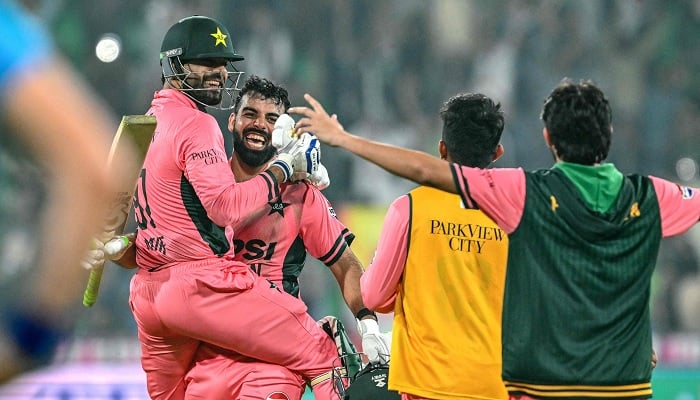 Pakistans Shadab Khan (2nd L) and Haris Rauf (L) celebrate after their teams victory over England in the ODI tri-series match at Gaddafi Stadium in Lahore, Pakistan, October 25, 2026.— AFP