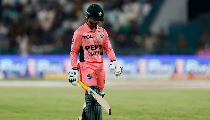 Saim Ayub walks after losing his wicket in ODI tri-series match against England at Gaddafi Stadium in Lahore on October 25, 2026. — Reuters