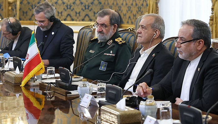 This handout picture provided by the Iranian presidency shows (R to L) Irans Foreign Minister Abbas Araghchi, President Masoud Pezeshkian, and National Security Council head Mohsen Rezaei during their meeting with Saudi Arabias defence minister, Pakistans army chief, and Turkiyes intelligence chief in Tehran on October 26, 2026. — AFP