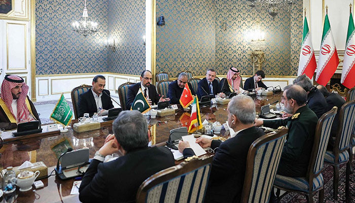 This handout picture provided by the Iranian presidency shows Irans President Masoud Pezeshkian, Foreign Minister Abbas Araghchi, and National Security Council head Mohsen Rezaei meeting with Saudi Arabias Defence Minister Prince Khalid bin Salman Al-Saud, Chief of Defence Forces Field Marshal Syed Asim Munir, and Turkiyes intelligence chief Ibrahim Kalin in Tehran on October 26, 2026. — AFP