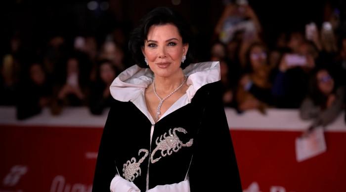 Kris Jenner shines in Elizabeth Taylor's scorpion cape