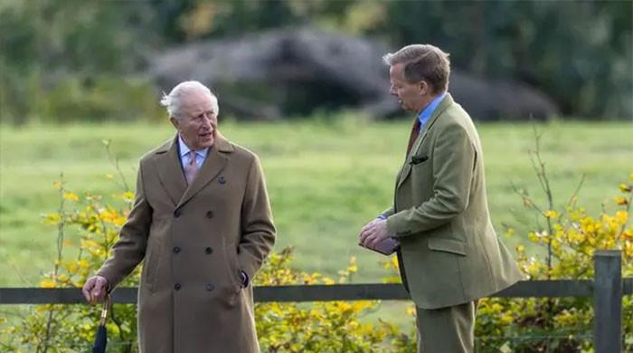 King Charles goes out on limb in 80mph winds while Queen stays sheltered