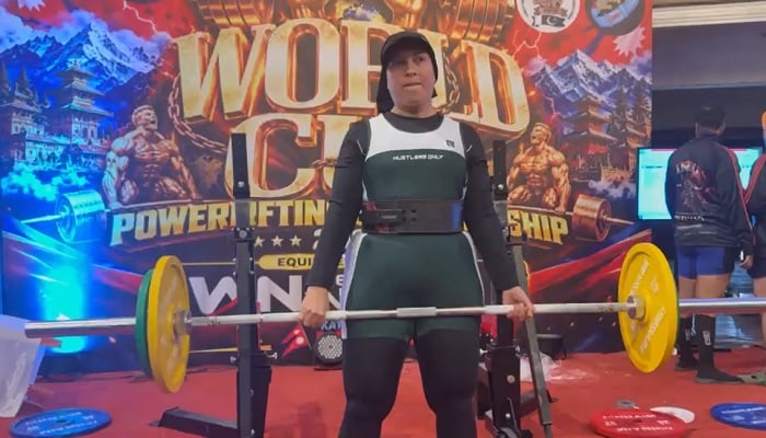 Powerlifter Ayesha Hassan performs a deadlift during an international powerlifting championship in Nepal.— Reporter
