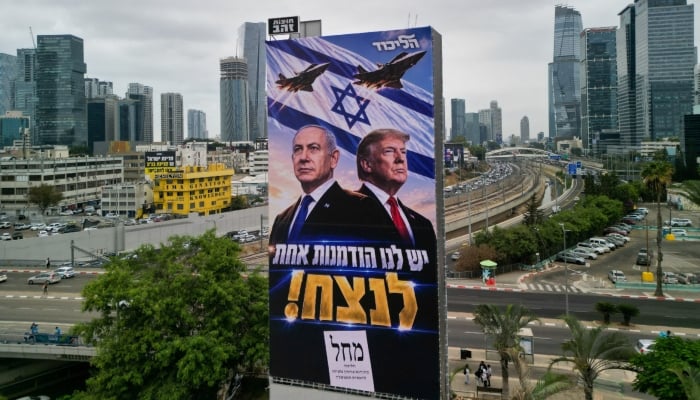A drone view of an election campaign display for Israeli Prime Minister Benjamin Netanyahus Likud party, depicting Netanyahu and US President Donald Trump with the words in Hebrew we have one opportunity to win!, the day before Israels national election, in Tel Aviv, Israel, October 26, 2026. — Reuters