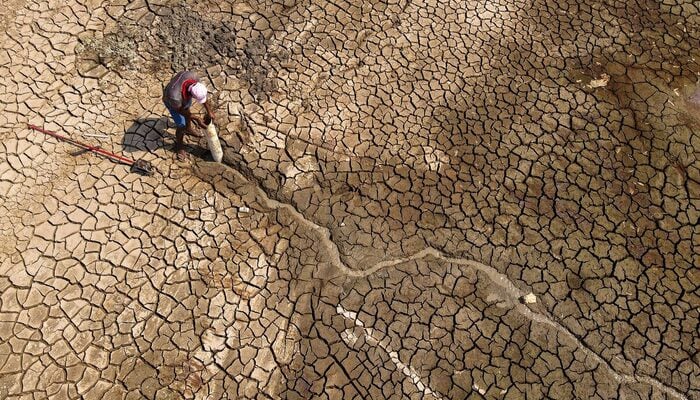 Ivalmir Silva searches for water on Puraquequara Lake, which has been affected by drought, in Manaus Brazil, October 6, 2023. — Reuters