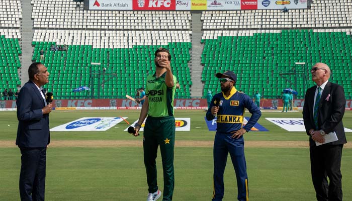 Pakistan captain Shaheen Afridi (left) flips the coin as Sri Lanka captain Kusal Mendis (second from right) calls the toss ahead of the fifth ODI tri-series match at Gaddafi Stadium in Lahore on October 27, 2026. — PCB
