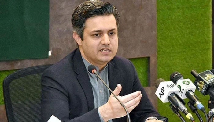 PTI leader and former federal minister Hammad Azhar addresses a press conference in this undated image. — PID/File