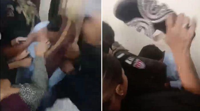 Karachi women thrash suspect accused of fleeing with their mobile phones