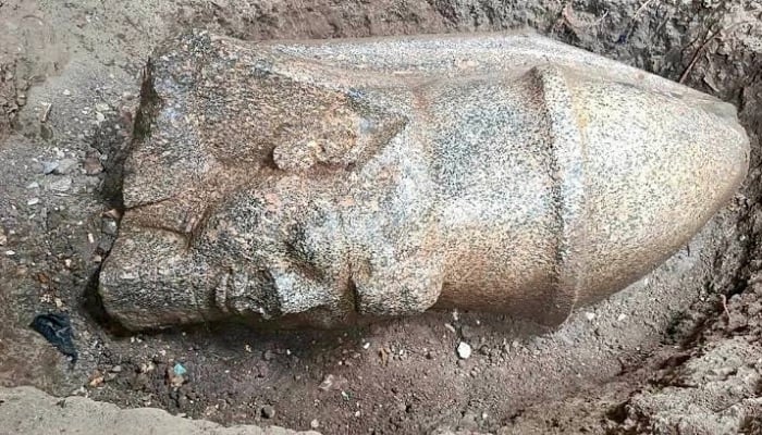 Egyptian farmer uncovers Colossal statues of Ramses II beneath his cucumber field
