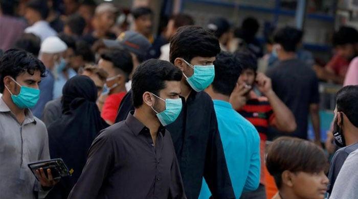 Karachi residents advised to mask up in crowded spaces amid surge in flu cases