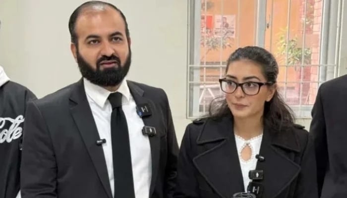 Human rights lawyer Imaan Mazari (right) with her husband and fellow lawyer Hadi Ali Chattha, during a court hearing in Islamabad on December 5, 2025. — AFP